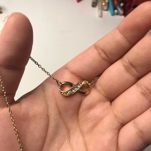 Infinity gold necklace with crystals